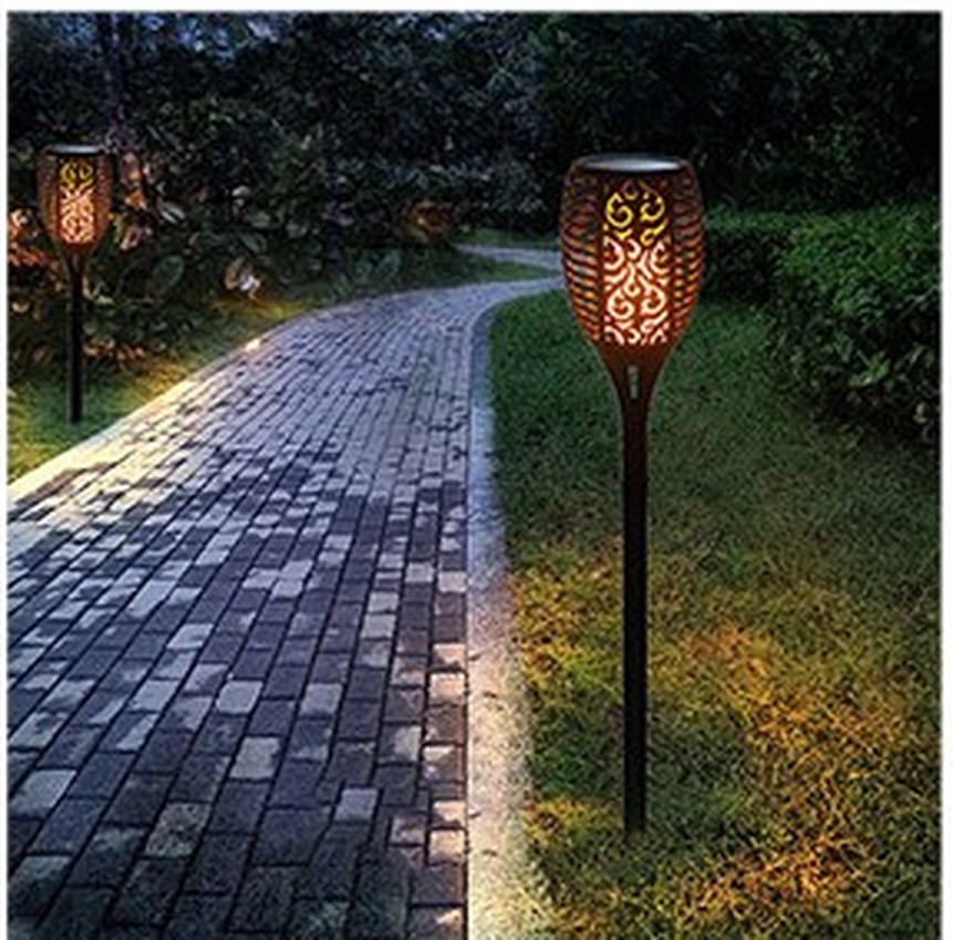 GOFA solar garden torch lights along a path